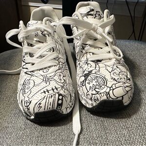 Sketchers VEXX UNO tennis shoes.